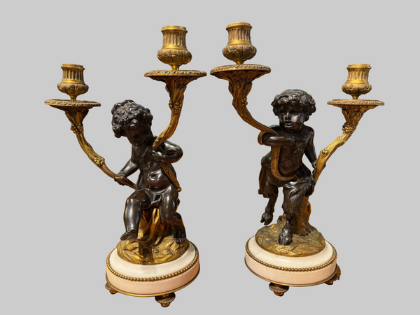 Pair of 19th Century French Candelabra After Clodion