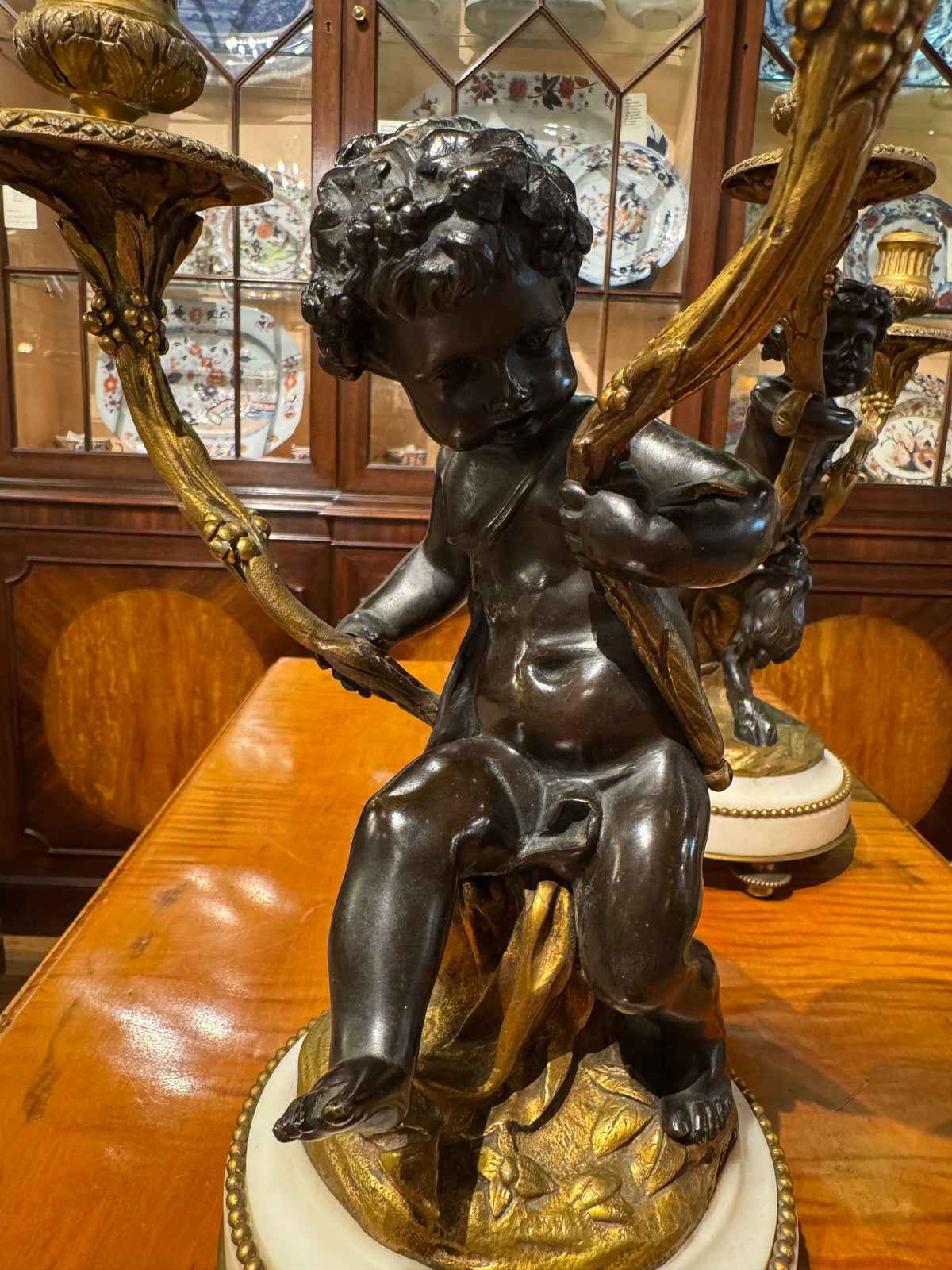 Pair of 19th Century French Candelabra After Clodion