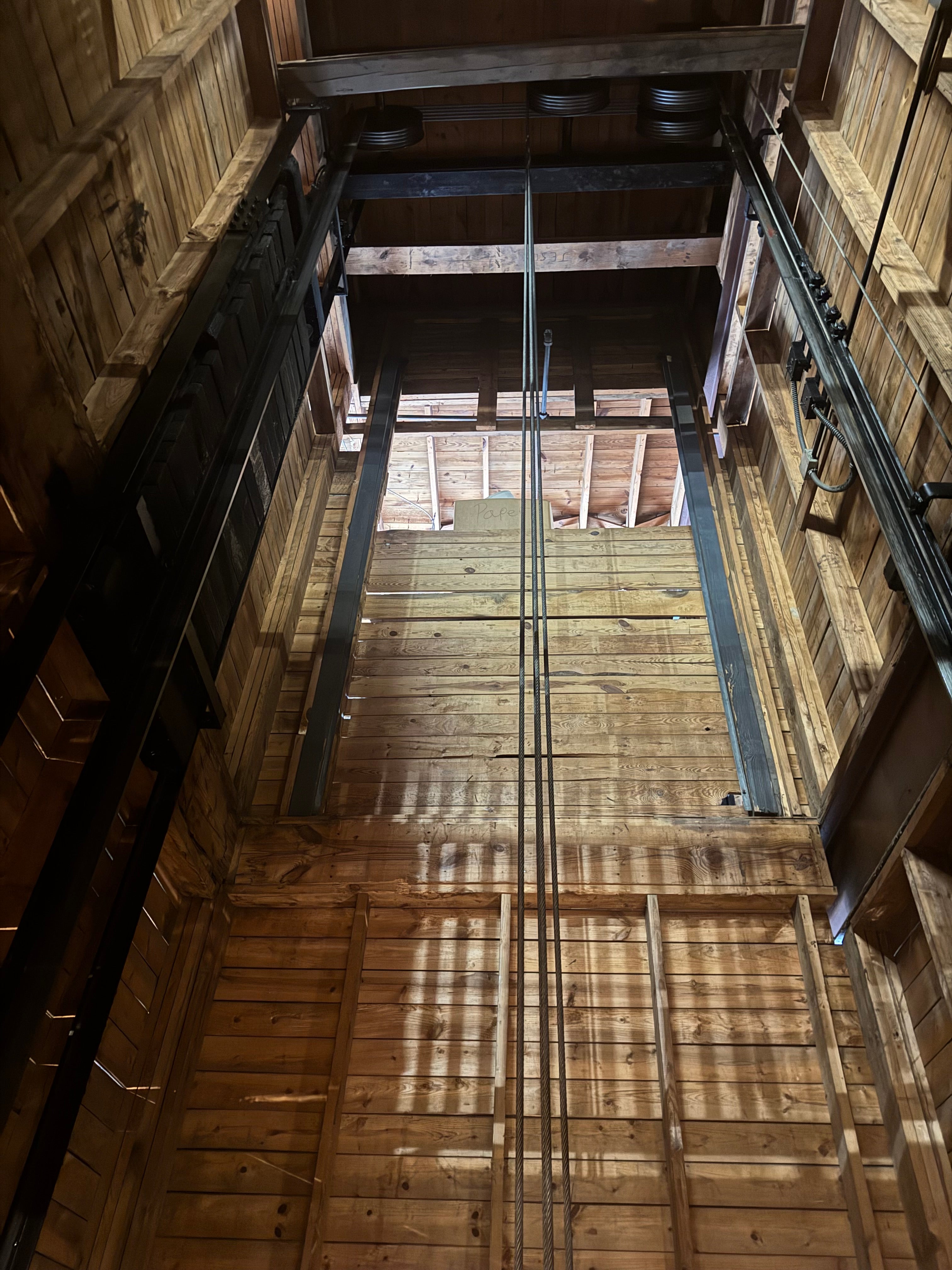 The almost hundred-year-old working freight elevator shaft