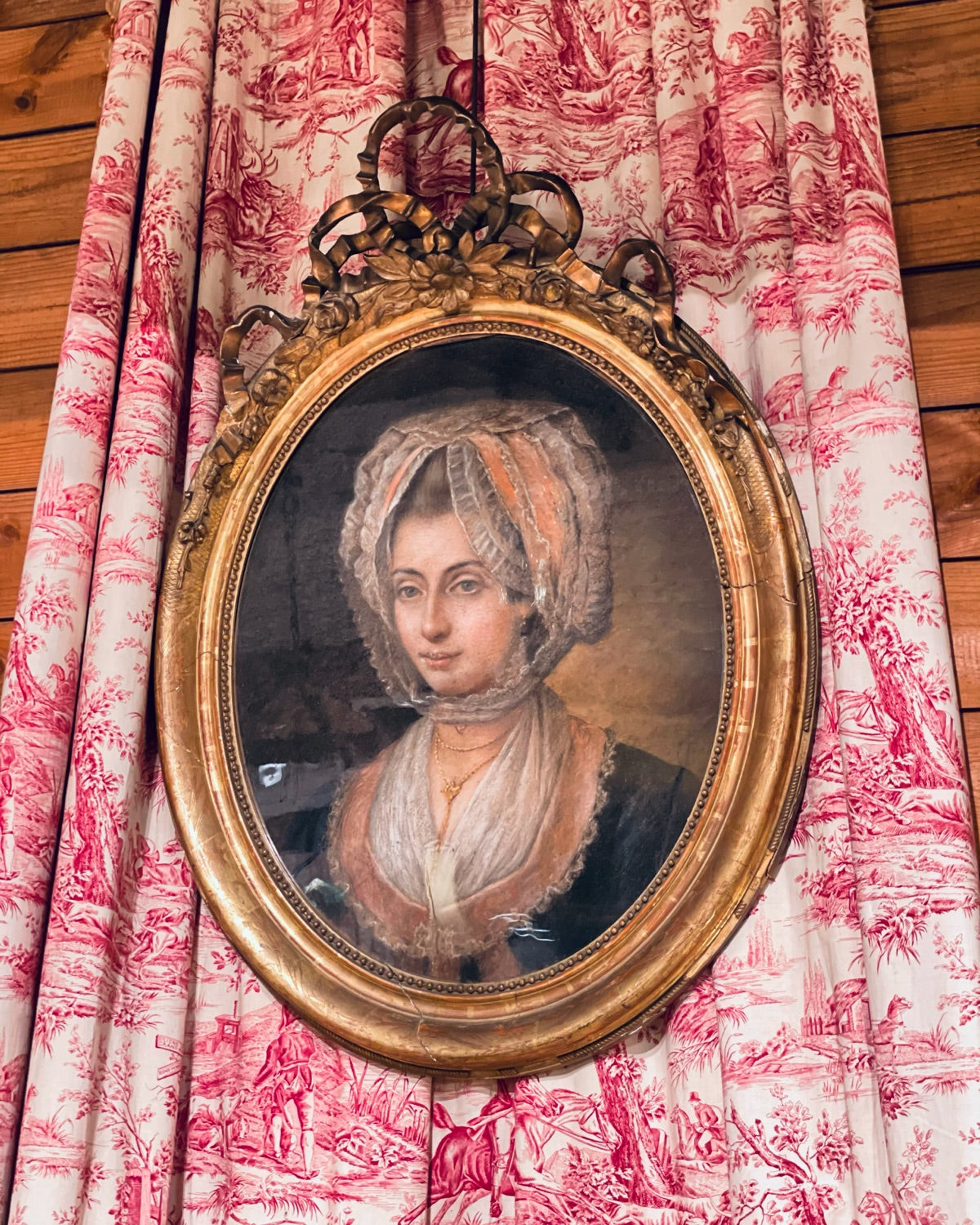 Antique oval portrait painting in a gilt frame