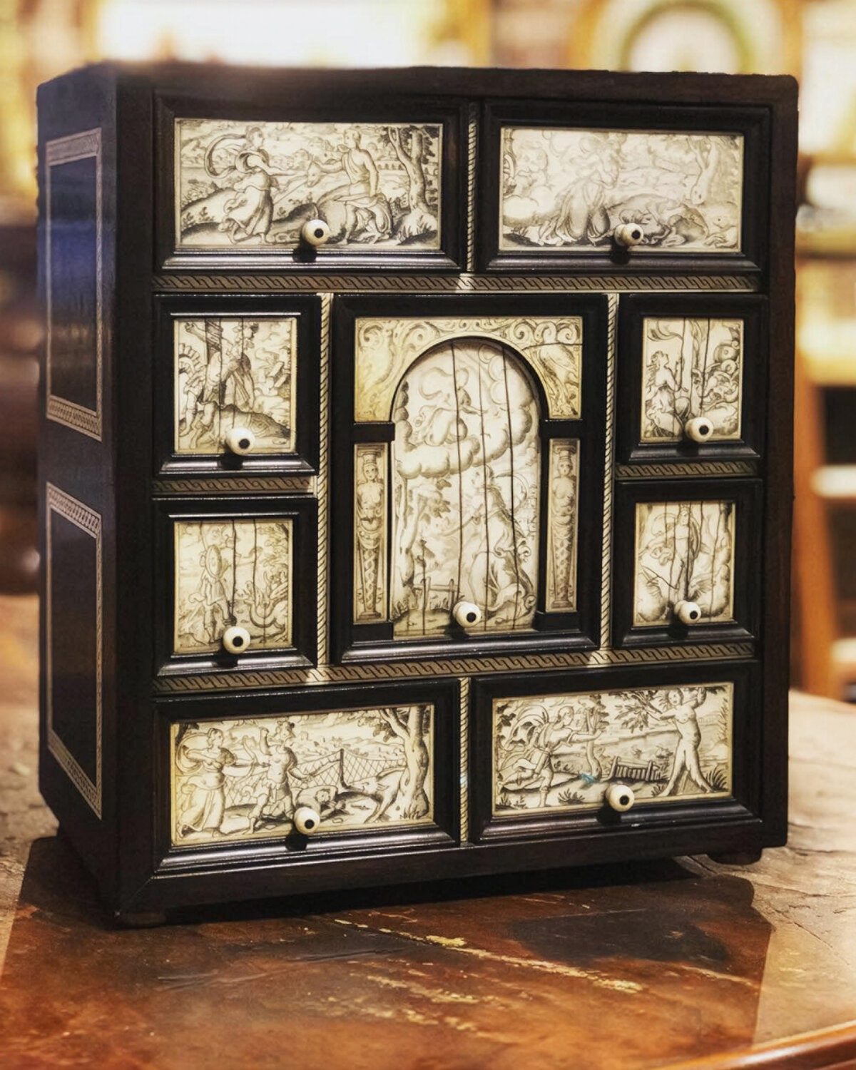 Antique ebonized cabinet with ivory inlay panels